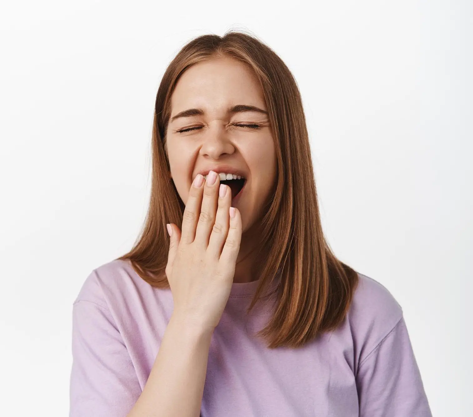 A woman with long hair mouth breathing because of underbite in her teeth at Redemption Orthodontics in Tallahassee, FL