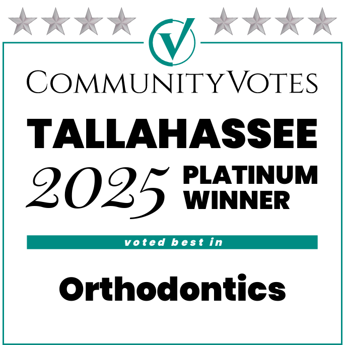 Platinum Winner badge for Orthodontics, awarded to Redemption Orthodontics in Tallahassee, FL, with stars along the top.